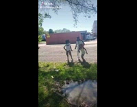 Dad dives into puddle of mud 