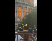 Woman birthday celebration in front of Colosseum