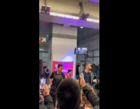 Crowd enjoys band performs at train station