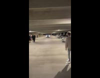 Police car in parking structure playing tokyo drift 