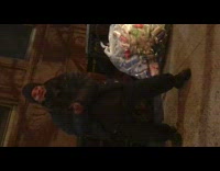 Guy on sidewalk sings medley of songs 