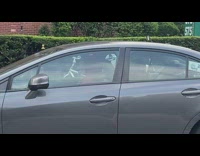 Man with face mask and red hoodie