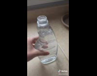 Girl shows eco friendly glass cleaner tablet 