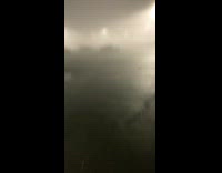 Fog at night at the empty parking lot