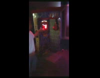 Guy kicks punching bag for game falls fail 