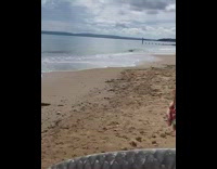 Man records himself surfing in rainwater on street