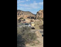 Pose on edge of rock