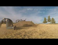 Man Falls Over Bike on Ground Ramp