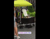 Girl sells ashtray decor black table umbrella 