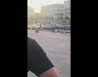 Black pants guy poses wood dock lake 