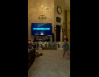 Mom laughs at baby copying character on TV movie 