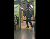 man dances when subway doors open