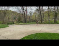 Little girl with glasses makes long basketball shot dad cheers