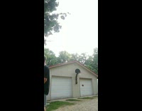 Kid black shirt successful  backward basketball shot