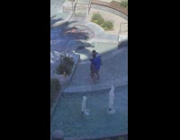 Man and Woman tiktok dance in the fountain