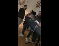 BitchMP - guy in beanie dancing while eating food