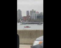 Group of people seen on top of brooklyn bridge 