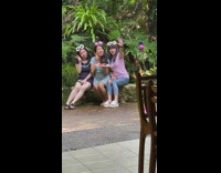 Three asian girls photoshoot phone on stand food