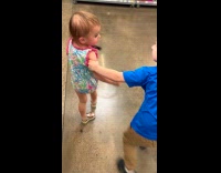 Siblings fighting over candy at Walmart