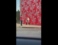Woman white top boots dance love graffiti