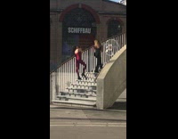 Two women black and red dress stairs pictorial