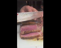 Chef cuts juicy wagyu steak 