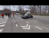 Guy tryies to show off with his car leaving school spins out