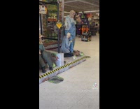 Halloween decoration on knees moving head back and forth 