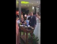 Wedding couple celebrate hear news F1 winner