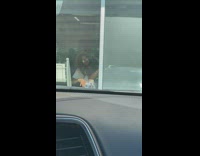 Woman in white top tiktok dance inside the store