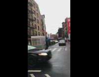 Guy waves metal cane around while walking 