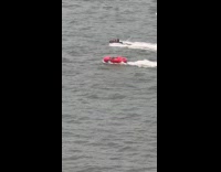 Guy rides customized jet ski at river