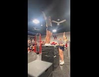 Woman falls after successfully jumping on foam box 