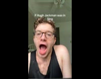 Man tank top sings like Hugh Jackman