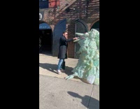 Collab WINY - Man Feeds Makeshift Monster with Plastic Bottle