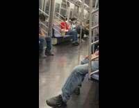 Yellow safety vest guy subway lifts dumbbell 