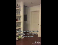 Guy in red sunglasses slides in with bottles of alcohol titos