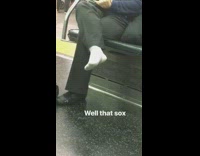 well that sox woman wears white socks on train