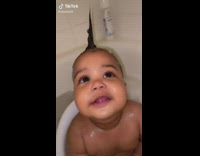 Mom makes babys hair stick up spike 