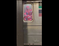 Four people dressed as spiderman in train
