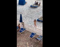 Boy stops sister make dance tiktok beach