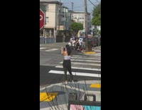 Girl white top hold cupcake stop sign