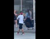 Submitter shows robot walks around the street