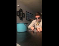 Guy opens beer bottle with knife chugs 