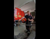 Slow motion firefighter slip clove hitch with rope