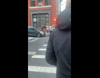 Collab WINY - Group of women walk in line sidewalk