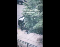 Collab WINY - Man wear skirt carry bagpipes walk street