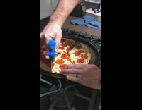 Guy cuts pizza random slices and direction