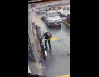 Man throws brush that kept falling