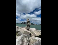 Guy builds rocks statue on timelapse video
